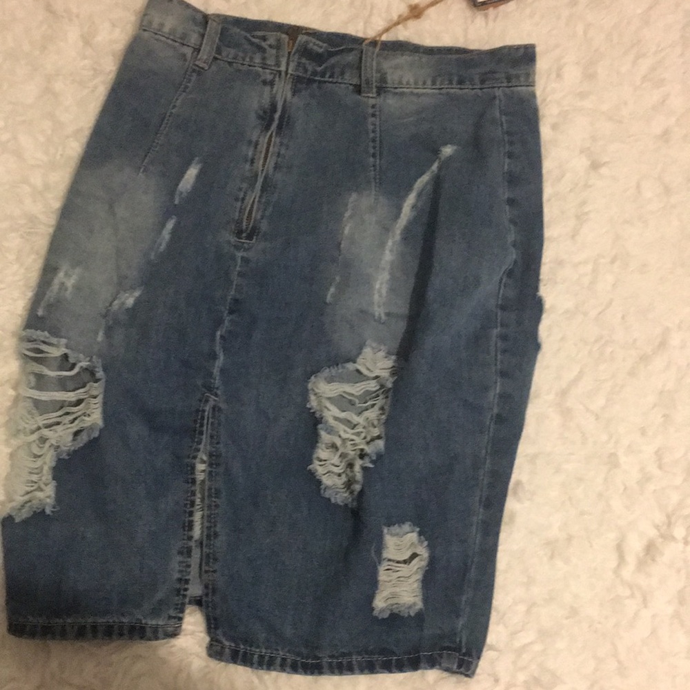 Ripped up denim skirt